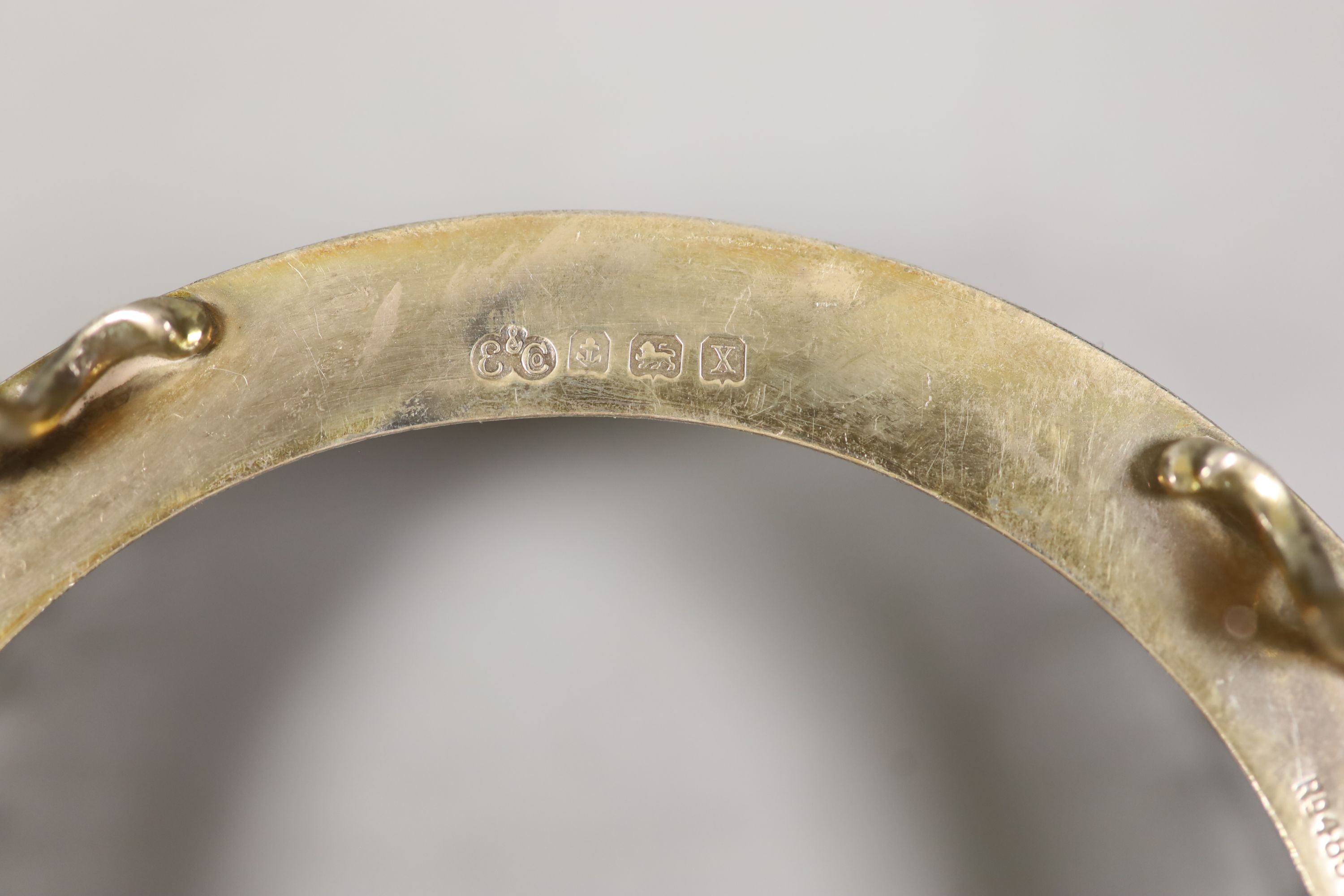 A late Victorian silver seven bar toastrack, with shaped ring handle, on paw feet, Josiah Williams & Co, London, 1896?, 21.2cm and a silver dish, lacking glass liner